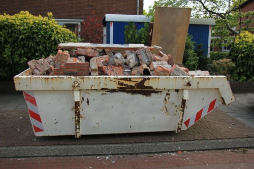 Professionals assessing garage for clearance in Eltham