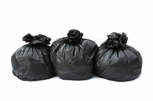 Commercial waste removal trucks in Eltham